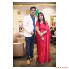 A couple poses for a photo at a family function. We make sure to get great portraits of the hosts and key family members during the event.