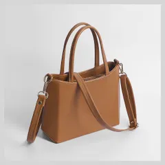 Accessories need to look premium. This is a professional product shoot of a women's handbag, where we focus on capturing the true color, texture, and shape. Multiple angles are key for showing all the details a customer looks for.