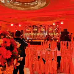 This view shows our team setting up the lighting and sound trusses for a large-scale sangeet. We manage the technical production to ensure every performance looks and sounds incredible.