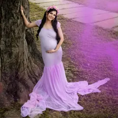 For this maternity photo, the makeup was kept natural and radiant to complement the soft, outdoor lighting. The look is all about celebrating the mother-to-be with a gentle and elegant style.