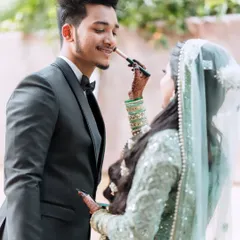 A playful and sweet moment between a Muslim bride and groom. Capturing these fun interactions is key to telling their unique story.