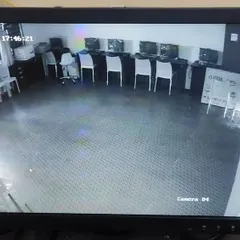 I also set up surveillance for larger spaces like this computer lab in a school. A single camera can monitor the entire room, ensuring the security of the equipment.