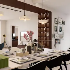 Here, the dining area looks back towards the living space, showcasing how different zones can be connected. We used a gallery wall to add a personal touch and a feature partition to create visual interest without closing off the space. The result is a cozy, layered, and inviting home.