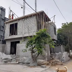 The joy of seeing a project take shape. This is the 'Nidhi Nilayam' residence under construction, with the core structure and blockwork rising, giving the first real sense of the building's form and volume on the street.