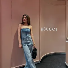 Another angle of the all-denim look. The fit of the corset and jeans creates a really flattering silhouette.