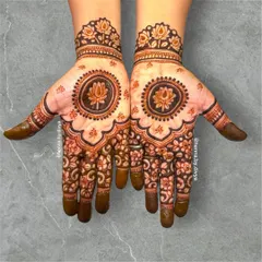 A graceful design centered around a lotus mandala. The surrounding floral patterns are delicate and leave plenty of open space for an elegant look.