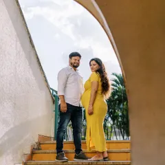 Using the strong lines of this outdoor staircase creates a unique and modern composition. The pop of her yellow dress against the sky makes for a vibrant and joyful maternity photo.