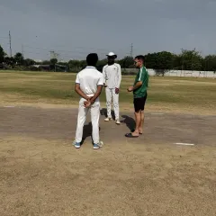 The coin toss before a practice match begins. We instill a sense of professionalism and sportsmanship right from the start, treating every game as a serious opportunity for growth.