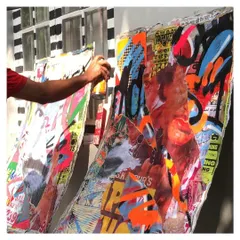 This is a more experimental, mixed-media piece. I combined layers of street posters with spray paint to create a textured, collage-like effect. It’s a different way to approach a large surface, blending graffiti with other urban elements.