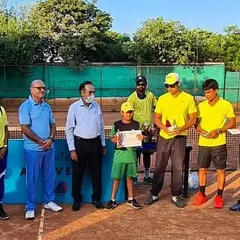 One of my U-10 players receiving his winner's certificate at our academy tournament. These events are a great way for kids to apply what they learn in coaching.