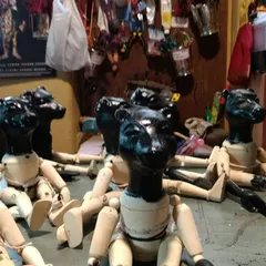 A glimpse into our workshop, where an army of Jambavan puppets is being prepared. This shows the process of creation, from the raw wooden forms to the final painted characters ready for the stage.