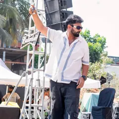 Raising a hand to the massive crowd. The Holi season is always one of the most energetic times of the year to perform.