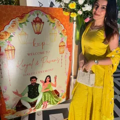 Another happy moment seeing my designs at a real wedding. This vibrant Haldi ceremony welcome board features a fun caricature of the couple and a bright orange theme with lantern illustrations.