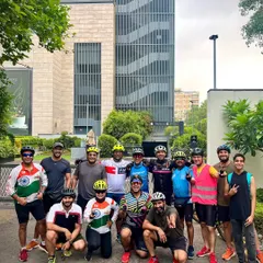 The whole crew posing after a weekend ride. The variety of jerseys and bikes shows the unique personality of each member in our cycling family.