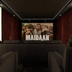 This theater features a bold red and black design with a starlight ceiling, creating a dramatic and immersive environment. It's the perfect setting for watching an epic film like "Maidaan" and feeling like you're part of the action.