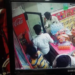 A clear view of the inside of a juice or provision store, captured by a CP Plus color camera.