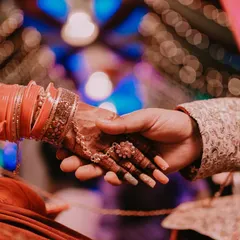 A simple yet powerful shot of a couple holding hands during their ceremony. This image symbolizes the beginning of a new journey together and is an example of how we focus on the small, meaningful details.
