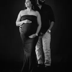 A timeless black and white portrait that focuses purely on the bond between you and your partner. This classic studio style creates elegant, lasting memories.