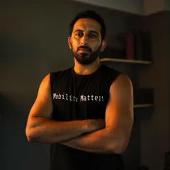 A rare moment of stillness. While my focus is always on movement, it's important to have a clear mission. My "Mobility Matters" shirt says it all.