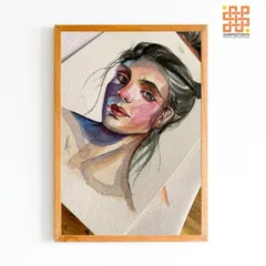 A finished watercolor portrait by one of our diploma students, beautifully framed. This is an example of the portfolio-quality work our students produce after honing their skills at the Gurukul.