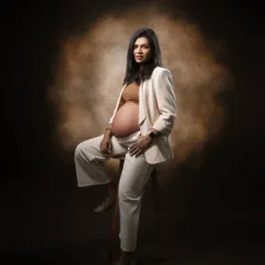 Empowered, elegant, and enduring. This portrait is for the boss lady embracing the miracle of life while owning her power, proving that motherhood is a journey of strength and confidence.