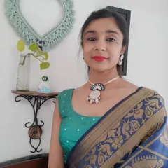 Modeling two of my favorite handmade necklace sets. The first is a bold orange mirror work set for a garba night, and the second is a more subtle blue and white mirror set that pairs beautifully with a silk saree.