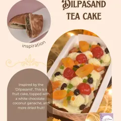 The Dilpasand Tea Cake from our Diwali hamper. It's a fruit cake inspired by the classic puff pastry, topped with a white chocolate coconut ganache and more dried fruit.
