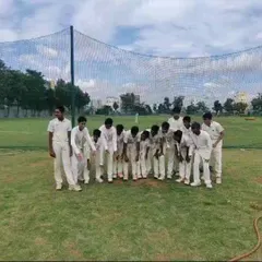A team huddle before a big match. These moments of unity are just as important as the skills we teach on the field.