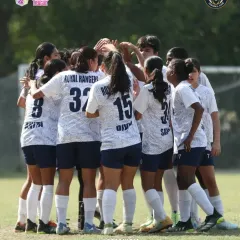 Together, we are stronger. This is our team in a pre-game huddle, a moment of unity and focus before heading into battle in the Women's Premier League.