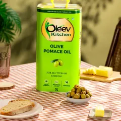 For this warm, rustic kitchen setup for Oleev, we used props like a gingham tablecloth, bread, and cheese to create a cozy, homely atmosphere. The leafy shadows in the background add character and depth.