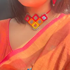 A close-up of this beautiful mirror-work necklace. For my Poila Boishak look, I chose handmade jewellery that complements the embroidery on my mul cotton saree.