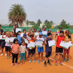Look at all these happy faces. This is our group of winners and participants from the Red and Orange Ball Tournament, each one leaving with a certificate and a sense of accomplishment.