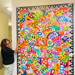 Adding the final touches to the 'Freedom Mural.' Every dot and line is placed with intention to contribute to the overall flow. The black and white border frames the chaos, keeping the energy contained and powerful.
