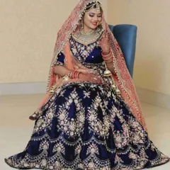For your big day, you deserve a lehenga that is truly special. This navy blue velvet bridal lehenga features intricate full french-knot and zari handwork. You can get your dream wedding lehenga like this one on rent from my store.