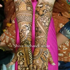 This design showcases a mix of traditional motifs, including peacocks and architectural jharokhas, with a combination of bold and fine lines for a striking effect.