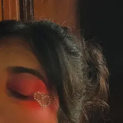 A close-up detail of the rhinestone heart. This kind of intricate makeup work is something I love doing for conceptual shoots or for clients who want a truly unique party look.
