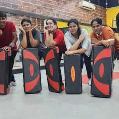 Taking a quick break after a tough step aerobics session. This workout is great for cardiovascular fitness and lower body toning, using simple equipment for a high-impact class.