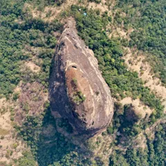 An aerial view of the Gorakhgad pinnacle in the Sahyadri mountains, a source of inspiration for us. This teardrop-shaped mountain showcases the power and beauty of natural rock-cut architecture.
