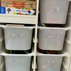 Labeled bins are the key to a tidy playroom. With clear, simple labels like "Clay Paints," "Puzzles," and "Cars," kids know exactly where to find their favorite activities and where to put them back.