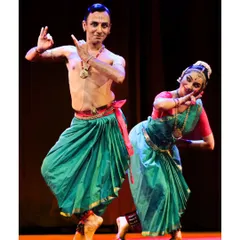 Performing a duet with a senior disciple from the ensemble. This interaction on stage is a dialogue, a shared storytelling between two artists, reflecting a journey of mutual learning and respect.