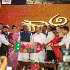 For large-scale corporate events like the 'Kasinasara' audio launch, we focus on capturing the defining moments. This group photograph showcases our ability to organize and shoot key stakeholders during a busy live event.