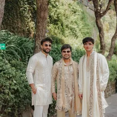 A group of friends, including YouTuber Nischay Malhan, dressed in our custom kurtas for a wedding event. We offer a range of styles, from simple elegance to heavy embellishment.