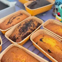 Freshly baked tea cakes cooling on the rack. This batch includes my popular marble and lemon blueberry flavors, all made from scratch for Rakhi gift orders.