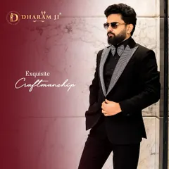 Exquisite craftsmanship is at the heart of what I do. This client is wearing a custom black tuxedo with crystal-studded lapels, a piece that combines classic tailoring with a bold, modern edge.
