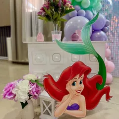 No Little Mermaid party is complete without Ariel! This life-sized cutout adds a perfect touch of Disney magic to the underwater scene.