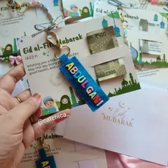 Our Eidi card inserts are a thoughtful way to gift money and a small present. This one is paired with a handmade felt name keychain for Abdul Gani.