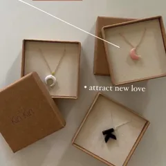 My 'āśra' Luna pendants, boxed and ready for gifting. This image shows the pink opal for attracting new love, white moonstone for luck, and black onyx for protection.