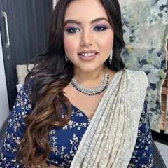 A direct look at this stunning blue smokey eye. I carefully blended multiple shades of blue and black to create this depth and dimension, making her eyes the center of attention.
