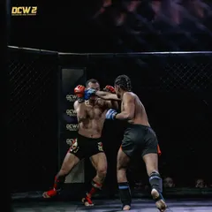 Exchanging punches in the cage. I'm not afraid to stand and trade because I trust my training and my chin.