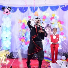A huge burst of streamers to celebrate the special day. This is the kind of high-energy moment I create to make every birthday party feel like a grand event.